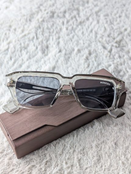 MOSCOT Transparent Rectangular Sunglasses with Dark Lenses