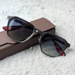 PRADA Dark Grey Angular Sunglasses with Red Accents
